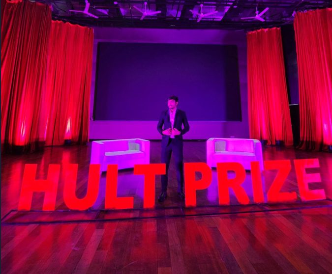 Atyant founders on stage at the Hult Prize 2026 national finals at IIT Bombay